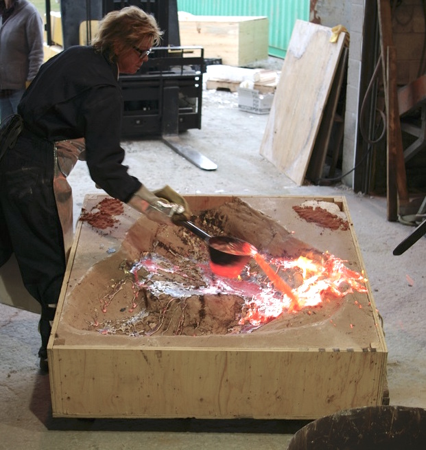 Gabrielle working on a cast in her studio.